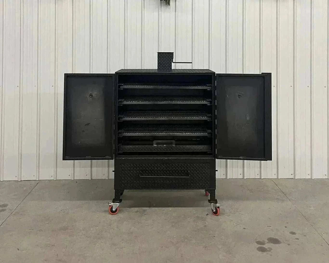 42 Cabinet Combo Smoker with open double doors, multiple grilling racks, black steel construction on caster wheels against a white wall background