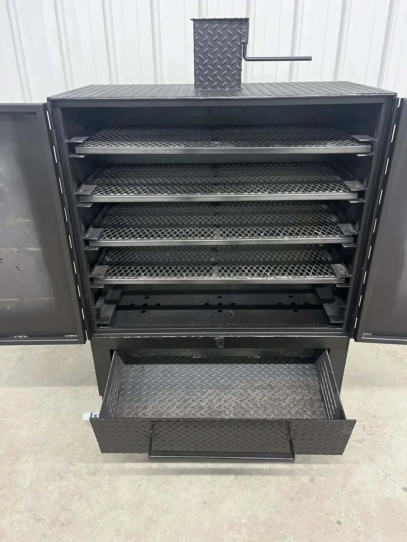 42 Cabinet Combo Smoker with multiple racks, solid steel construction, and pull-out ash pan for versatile wood and charcoal smoking.