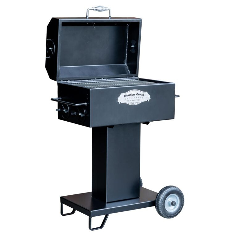 Black grill with wheels on a white background