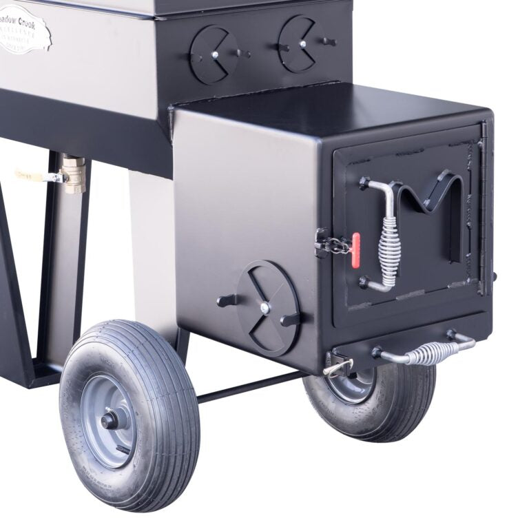 Black metal cart with wheels on a white background