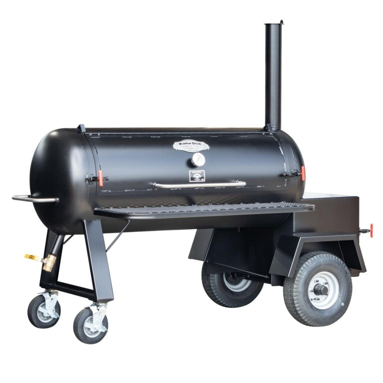 Black barrel-style barbecue smoker on a white background
