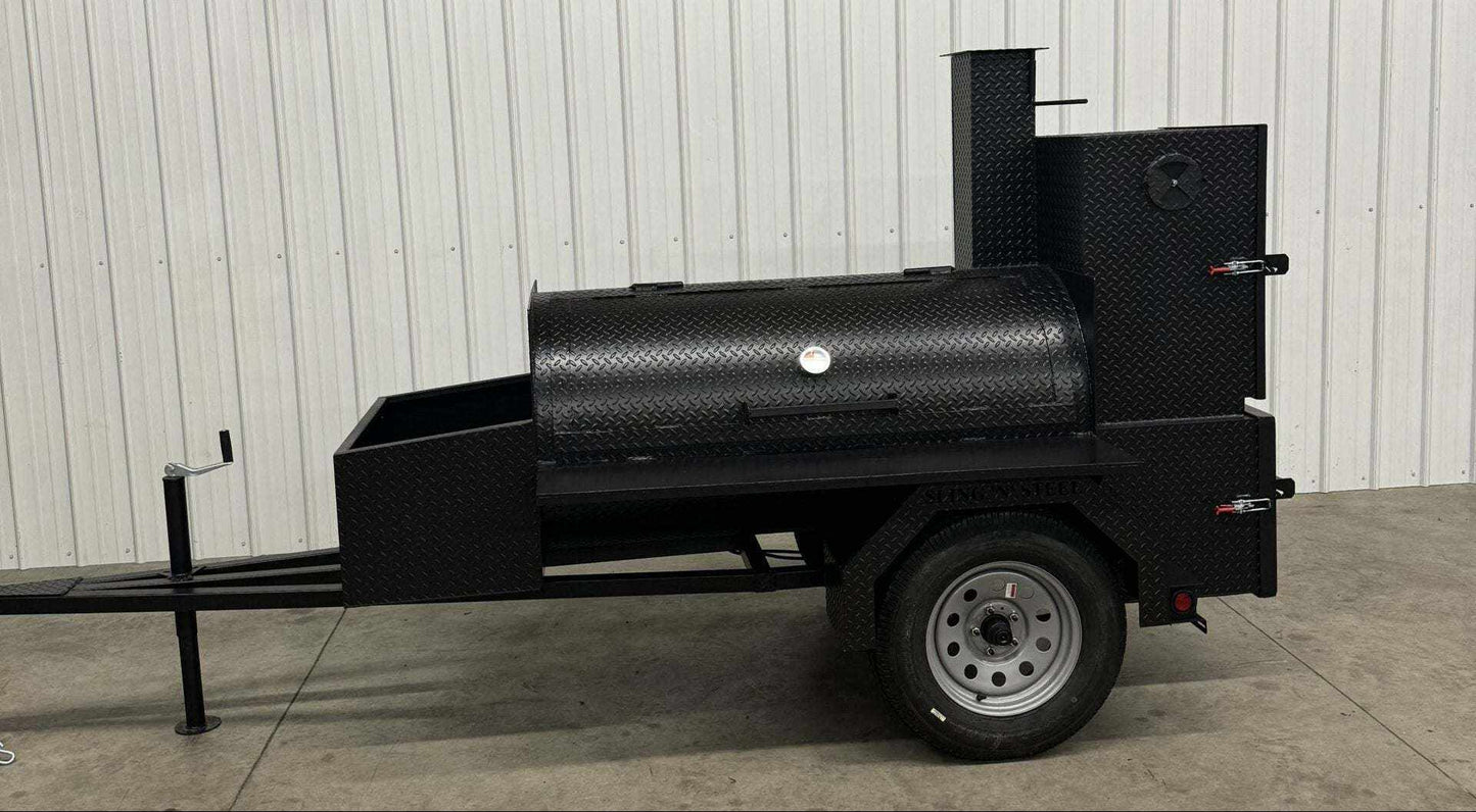 Competition 60 Smoker trailer-mounted barbeque smoker with large cooking racks, rib box, insulated firebox, and storage basket in black steel