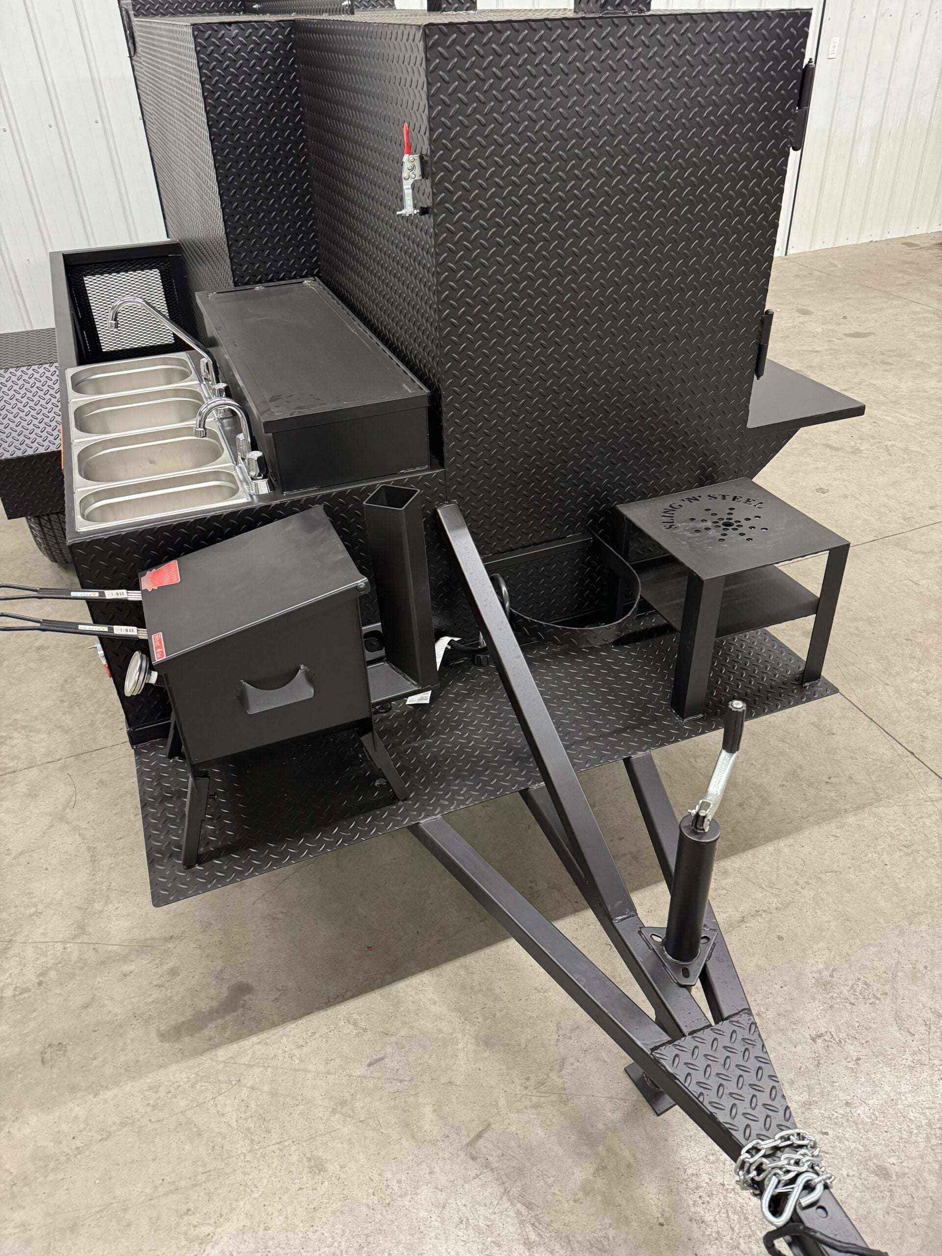 custom charcoal grills with SNS 4060 smoker on a reverse flow catering trailer for versatile cooking and catering business use