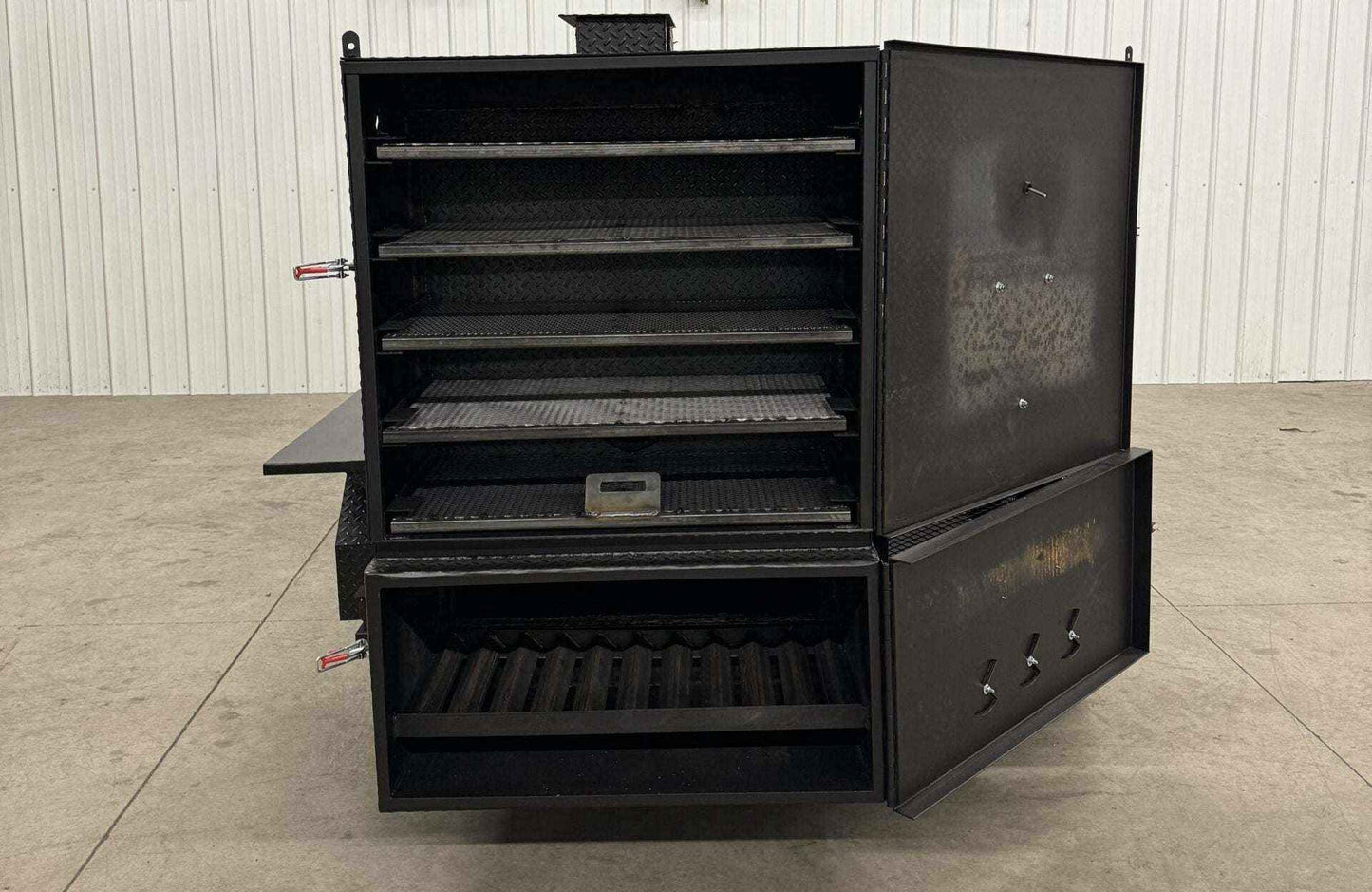Custom charcoal grills with multiple racks and reverse flow smoker for versatile catering use
