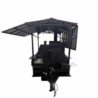 Reverse Smoker Ultimate Smokehouse 60 with roof, sink, 36-inch griddle, XL charcoal grill, and insulated firebox
