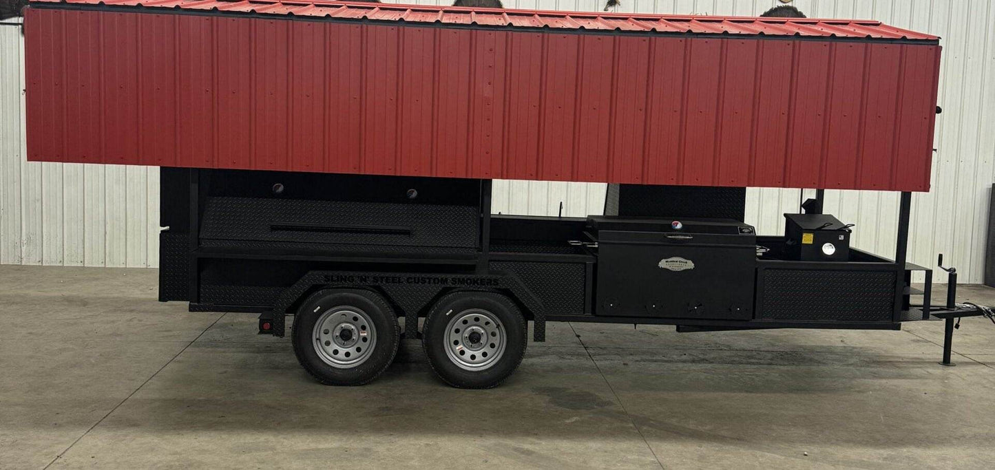 Large black custom ultimate smokehouse 72-inch smoker on trailer with red roof and multiple cooking compartments including charcoal grill and chicken pit