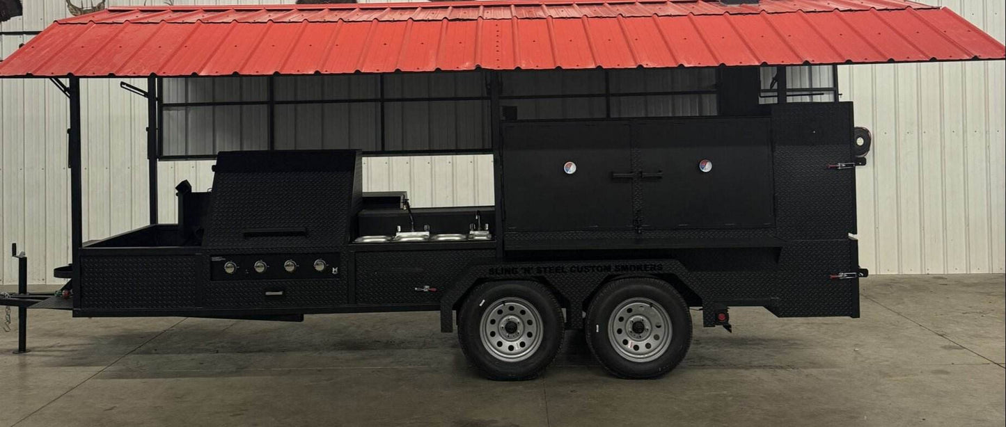 Ultimate Smokehouse 72-inch black smoker on trailer with red roof, sinks, griddle, and charcoal grill for large capacity BBQ cooking