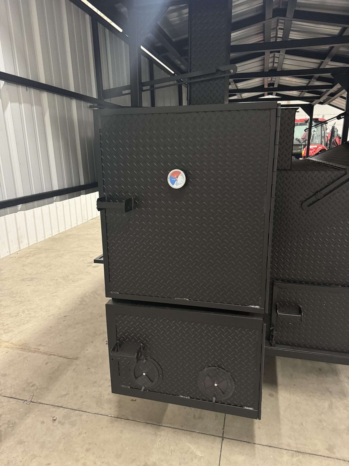 Commercial Smoker Custom Ultimate Smokehouse 72-inch reverse flow smoker with insulated firebox, griddle, and sink package in a diamond tread steel finish