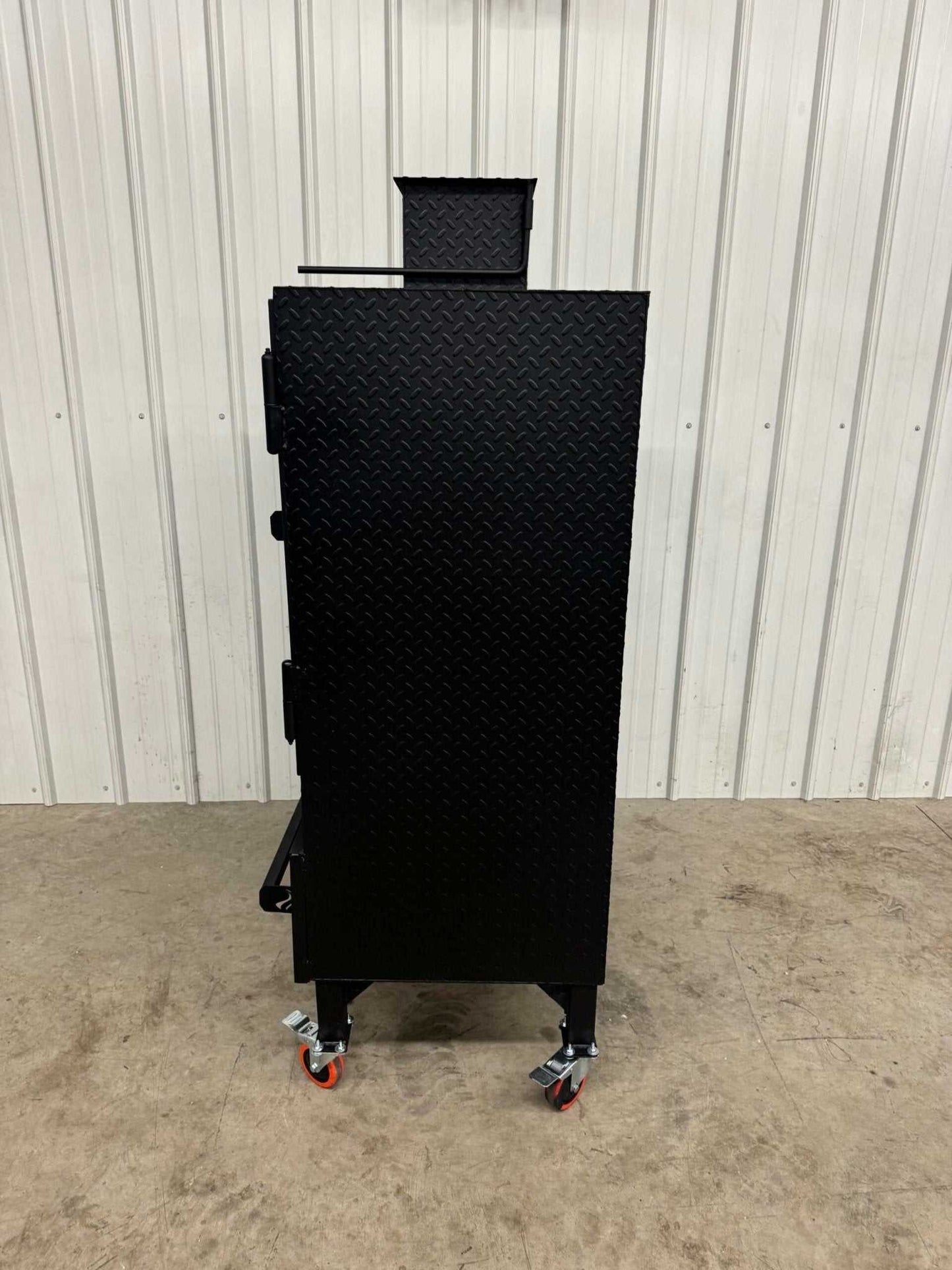 Commercial grade SNS Pellet Vault pellet smoker with heavy-duty build, 4 slide-out racks, large hopper, and digital PID controller, ideal for catering and backyard BBQs.