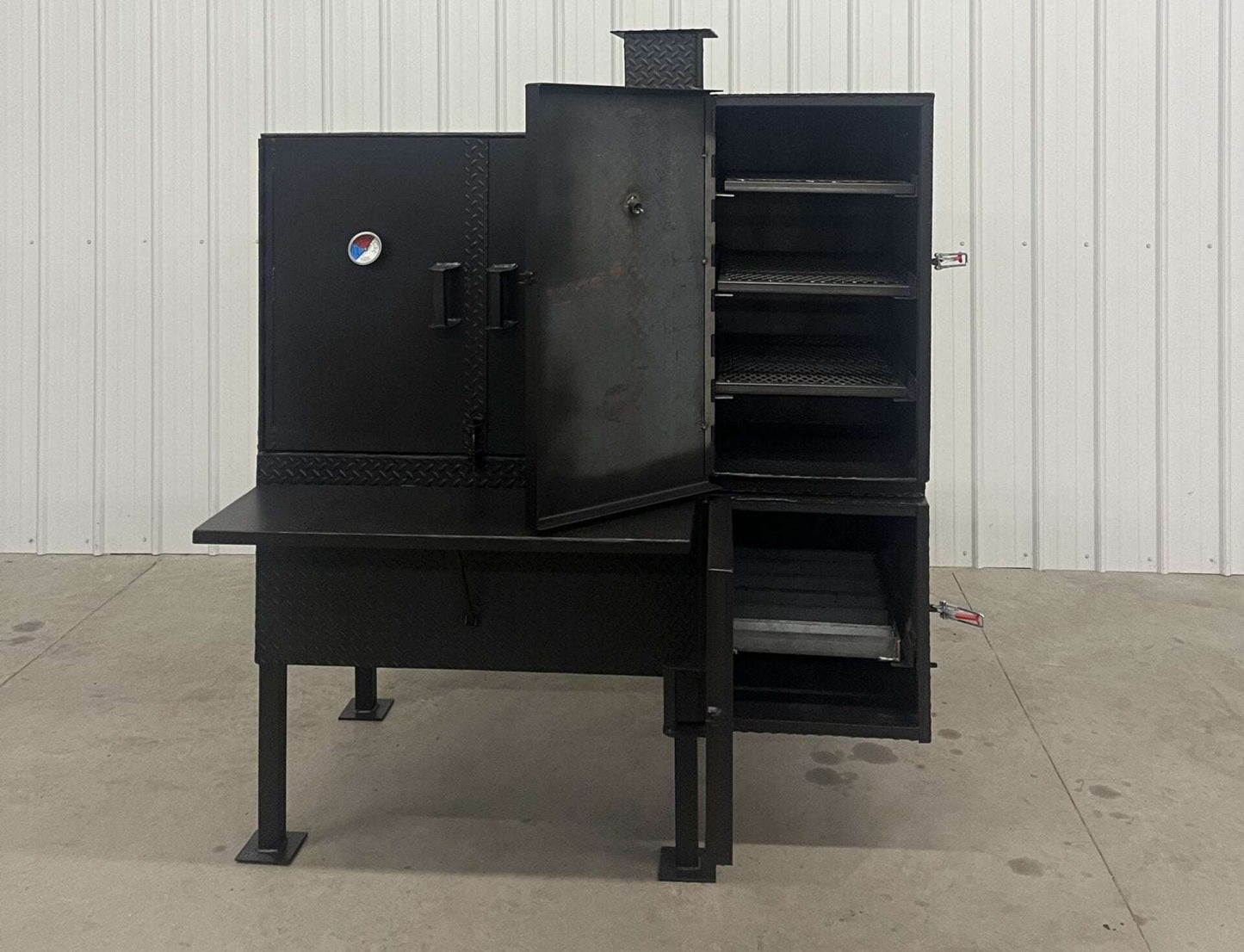 SNS 40 Cabinet vertical smoker with large chamber, three racks, double-walled insulated firebox, and heavy-duty build for patio or trailer use
