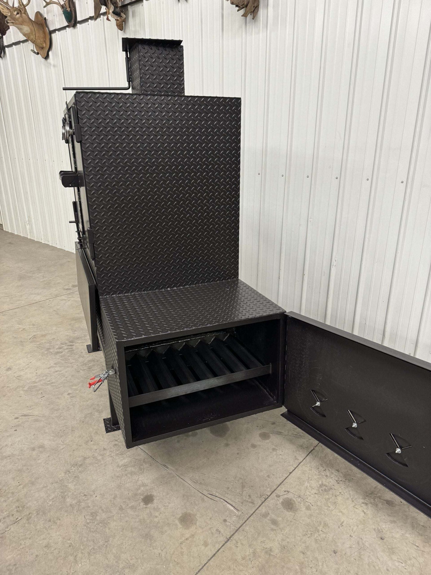 Black SNS 40 Cabinet Smoker vertical smoker with open firebox and heavy-duty steel construction