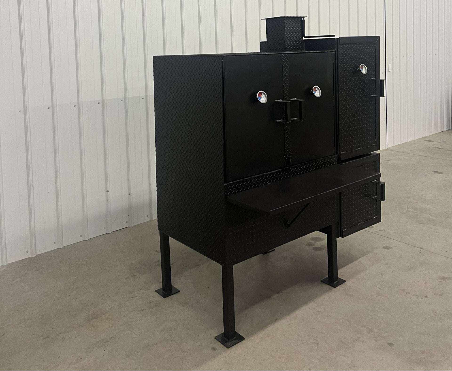 SNS 40 Cabinet Smoker heavy-duty black vertical smoker with large 30x40 chamber and insulated firebox