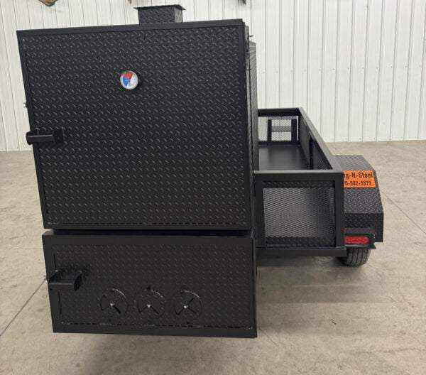 SNS 4060 Smoker Grill with cabinet main chamber made of diamond tread steel, large cooking capacity, and insulated firebox for versatile catering use.