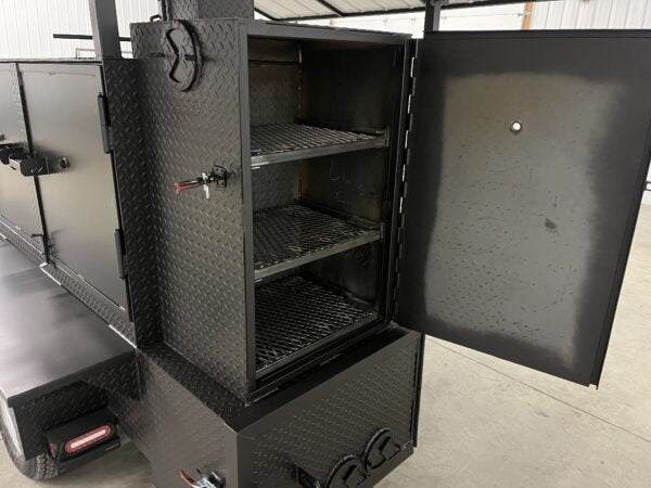 Open black SNS 60 smoker cabinet with three slide-out cooking racks and diamond tread steel exterior for commercial BBQ use