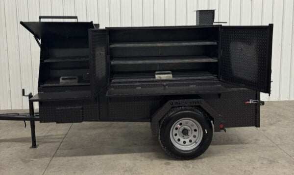 Portable SNS 60 Cabinet smoker and charcoal grill trailer for catering and events