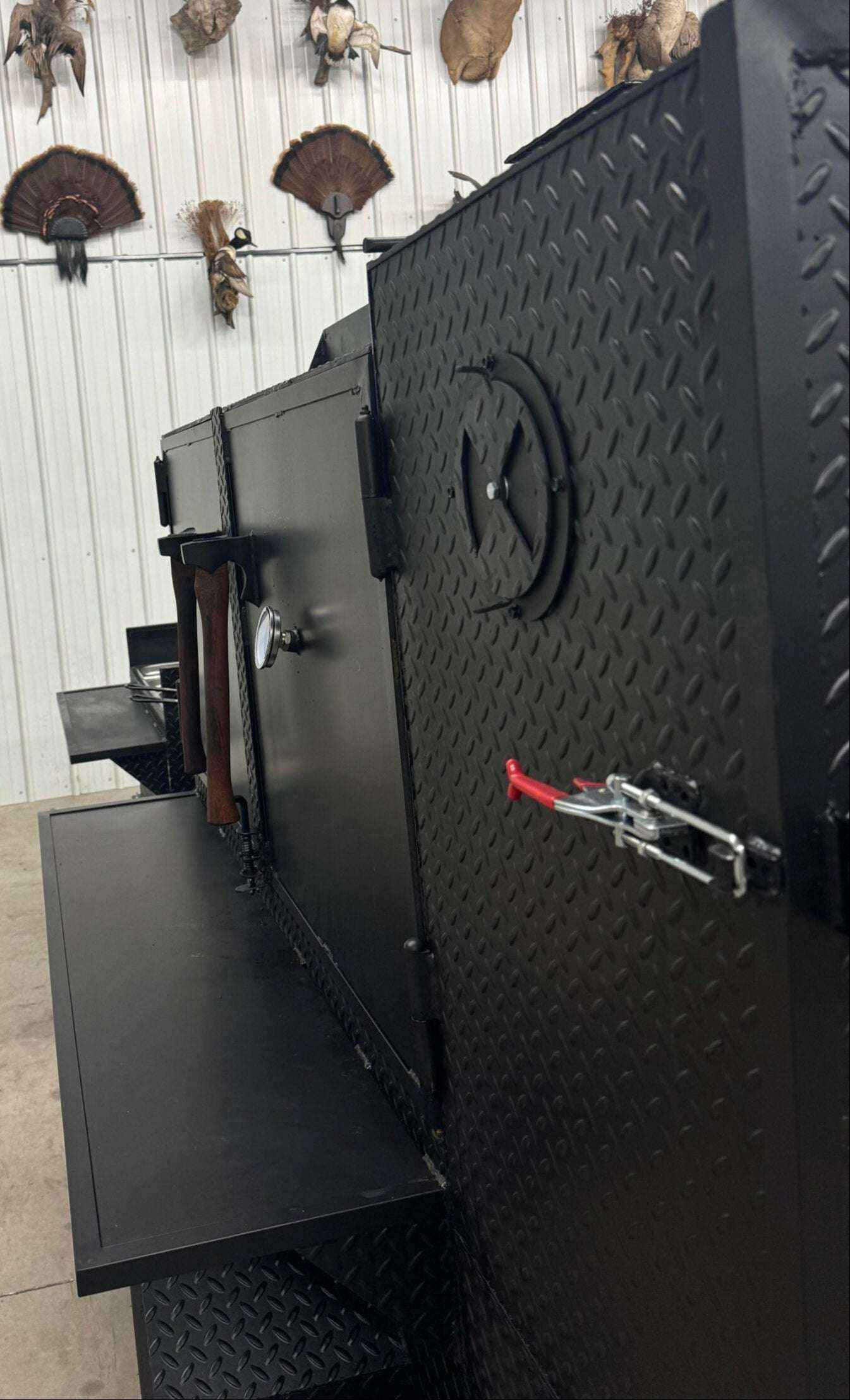 SNS 60 Cabinet black diamond tread steel smoker with sink and deep fryer package in industrial setting