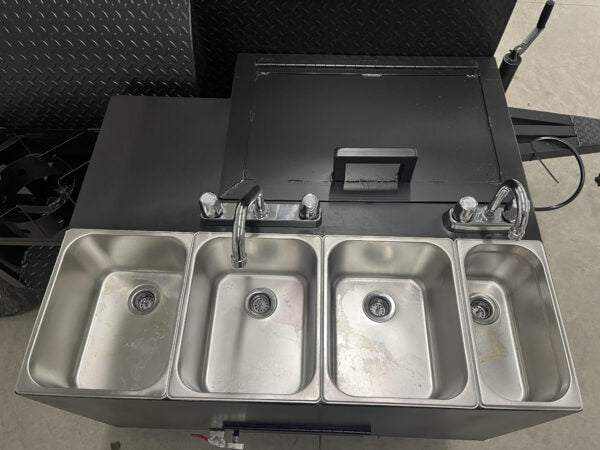 Offset Smoker SNS Barrel 60 catering trailer with 3-bay sink, hand wash station, and instant hot water system.