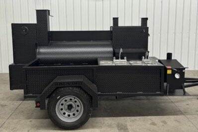 SNS Barrel 60 Offset Smoker Catering Trailer with sink package and fish fryer mounted on backside in black rolled diamond tread steel design