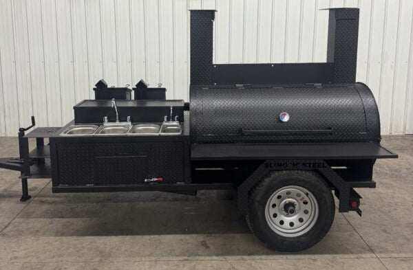 SNS Barrel 60 Charcoal Grill catering trailer with large smoker, dual fryers, three-bay sink, and storage compartments