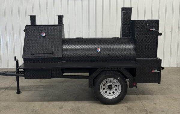 60-inch SNS Barrel smoker and charcoal grill on trailer with dual cooking racks and insulated firebox for commercial use