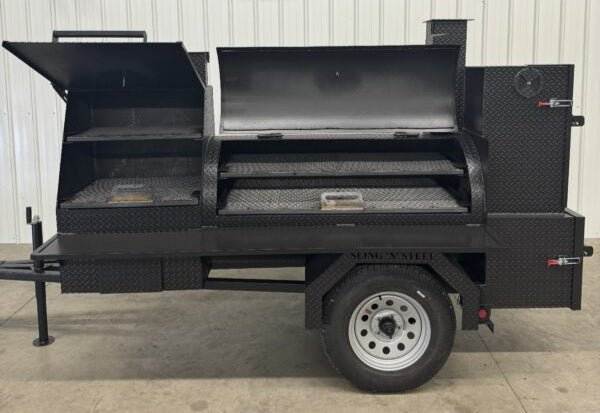 SNS Barrel 60 inch reverse flow smoker and charcoal grill with dual cooking racks, insulated firebox, rib warming box, and fryer stand on trailer mount