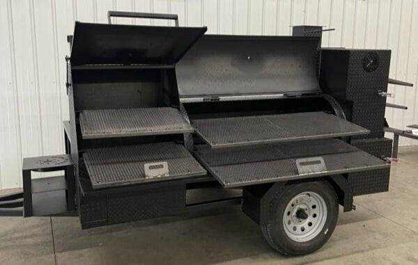 SNS Barrel 60 hog cooker with grill and full-length storage pull-behind BBQ smoker trailer