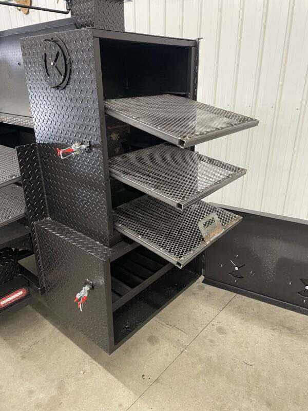 SNS Barrel 60 hog cooker with grill and full-length storage, featuring triple cooking racks and diamond tread steel construction