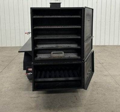 SNS Beast Cabinet Smoker with multiple cooking racks and insulated firebox, large capacity for smoking meats.