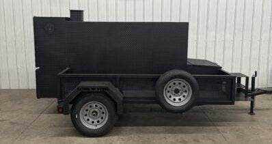 SNS Beast Cabinet Smoker trailer with large cooking capacity and full length storage in black steel