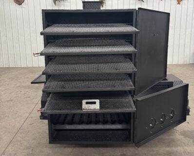 SNS Beast Cabinet Smoker with full-length storage, six slide-out cooking racks, insulated firebox, warming box, and large capacity for smoking meat