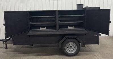 SNS Beast Cabinet Wood Smoker with full length storage, 6 cooking racks, insulated firebox, warming box, and large capacity for smoking meats.