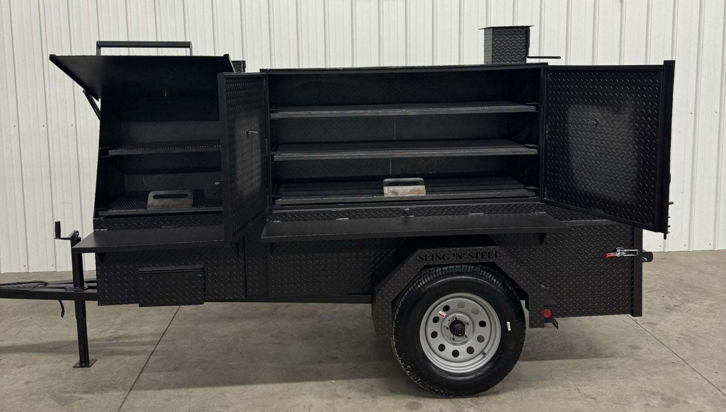 Black SNS Cabinet 60 catering trailer BBQ pit with open smoker compartments and cooking racks on single axle wheel