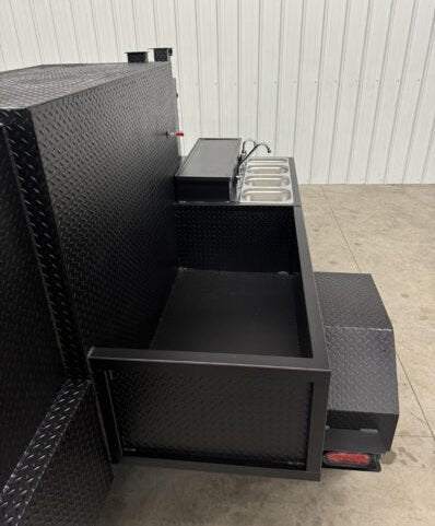 Black SNS Cabinet 60 BBQ catering trailer with built-in sink package and smoker pit in diamond tread steel.
