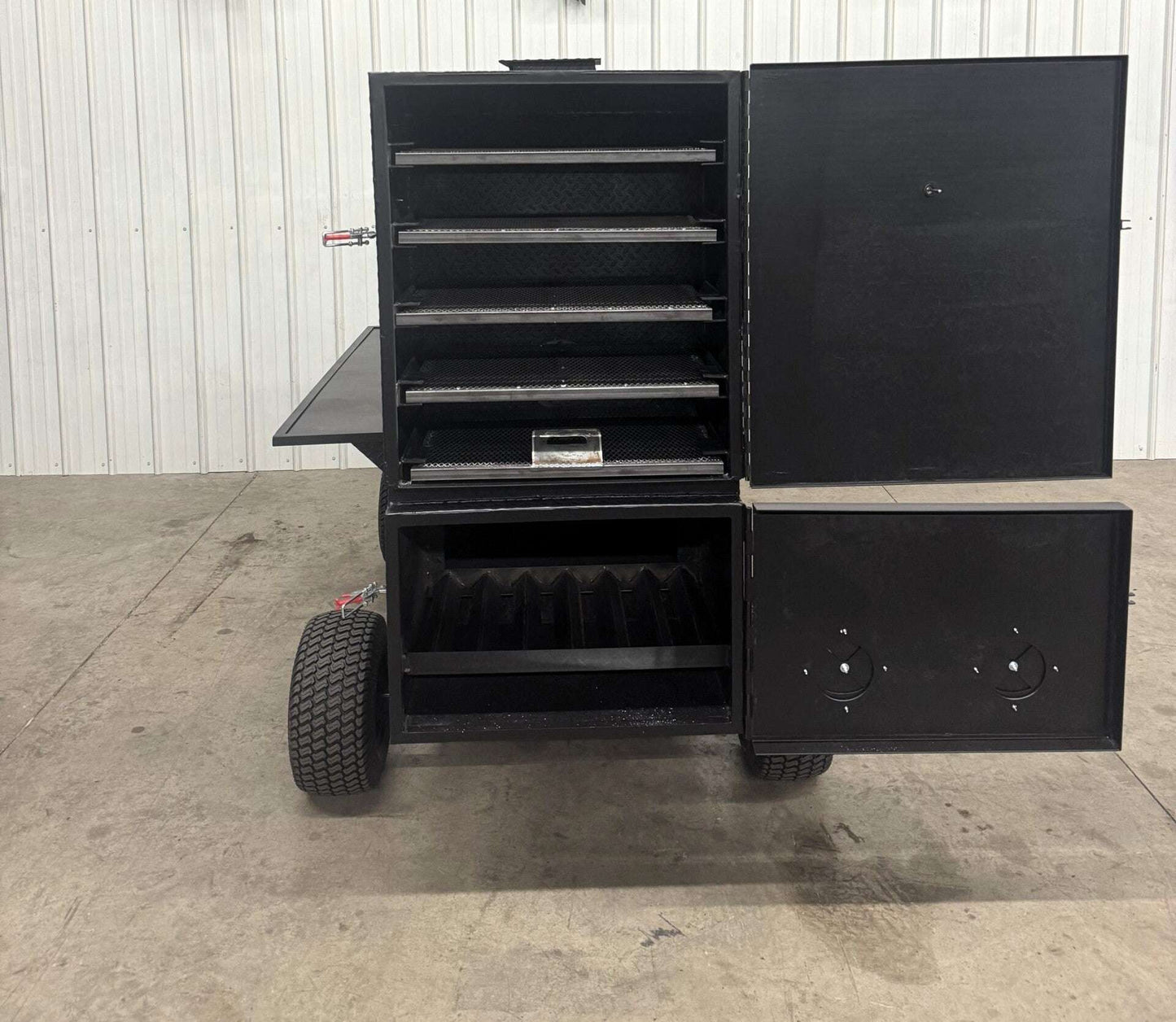 SNS Cabinet 60 Competition Smoker with multiple cooking racks, insulated firebox, and rib box, designed for large capacity smoking.