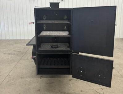Wood fired smoker SNS Competition 60 Cabinet Smoker with BBQ 42 rotating rack pit in black, open cabinet showing cooking racks and firebox.