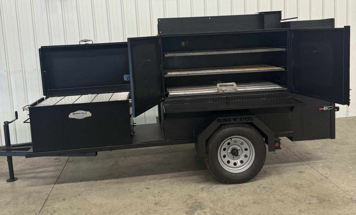 Wood fired smoker SNS Competition 60 cabinet smoker with BBQ 42 rotating rack pit on trailer