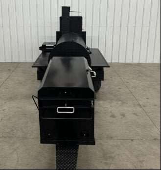 Custom Pits SNS Competition 60 charcoal smoker with rotating grill rack and insulated firebox for commercial BBQ catering.