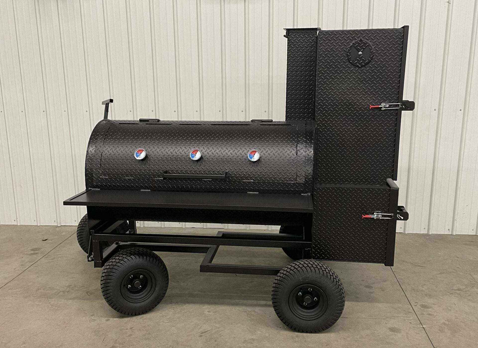 SNS Competition Smoker wagon-style BBQ grill with multiple temperature gauges and large cooking racks on wheels
