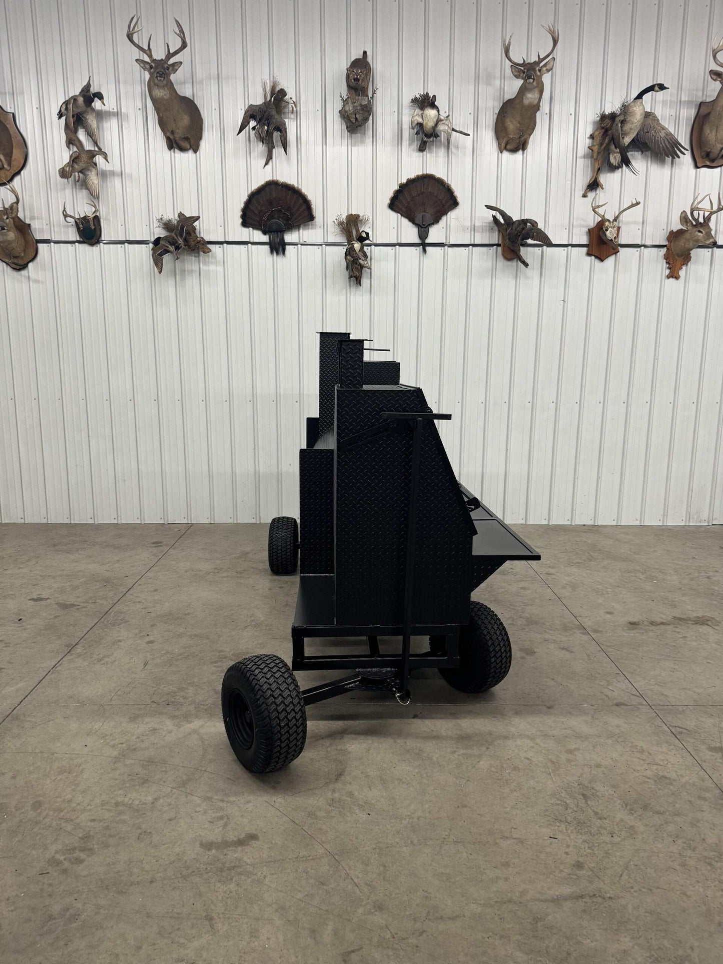 SNS Competition Wagon Smoker with large cooking racks and charcoal grill on a wheeled wagon chassis