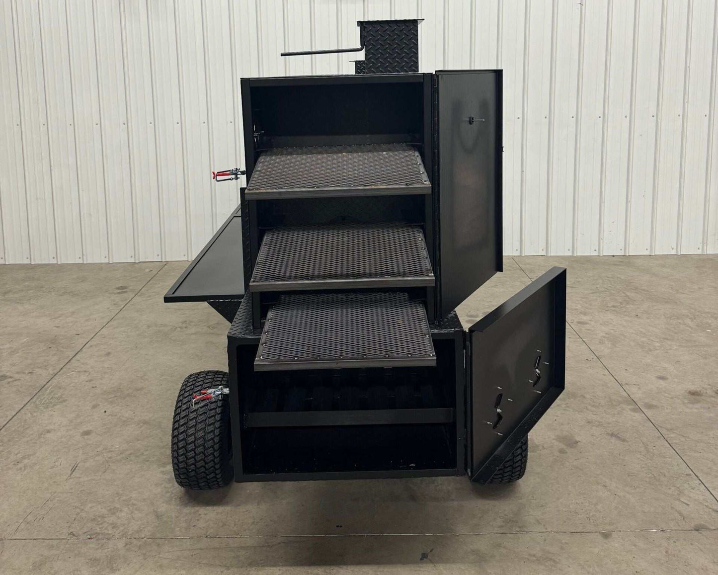 SNS Competition Wagon Backyard BBQ smoker with multiple cooking racks and charcoal grill on wagon chassis with pull handle