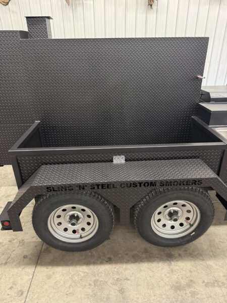 SNS Deluxe 72 Catering Trailer Smoker with custom steel construction and dual axle wheels for versatile BBQ catering business use