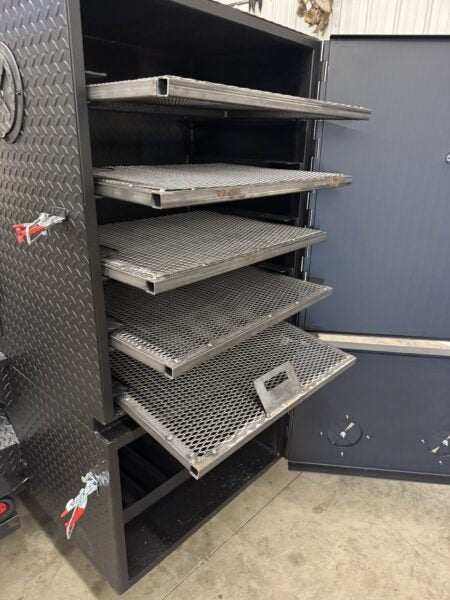 SNS Deluxe 72 Catering Trailer Smoker with multiple cooking racks and stainless steel trays for large-scale BBQ catering