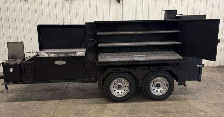 SNS Deluxe 72-inch catering trailer smoker with multiple cooking racks and compartments for versatile BBQ catering use
