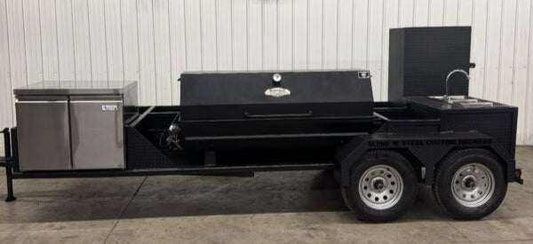 SNS Hospitality Trailer BBQ trailer with propane grill, refrigerator, sinks, and large cooking capacity for events and catering.