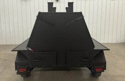 SNS Mega Grill dual-pit commercial grilling trailer with charcoal trays and fryer stand
