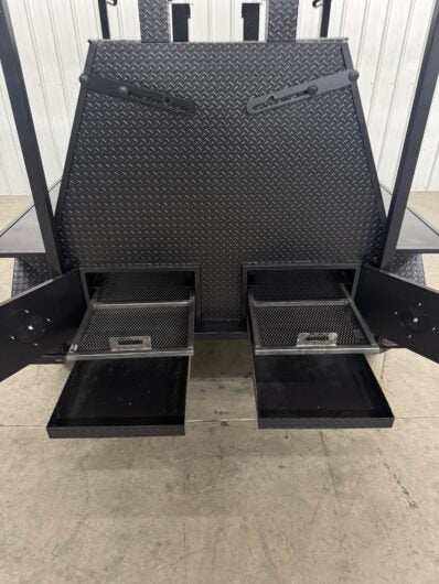 Front view of Giant Grill SNS Mega Grill showing dual cooking pits with pull out charcoal trays and ash pans