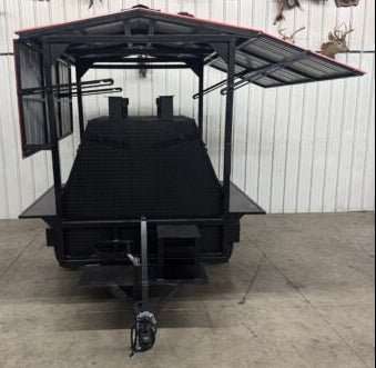 Giant SNS Mega Grill dual cooking pits trailer with roof and charcoal trays for commercial BBQ catering