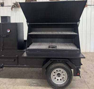 SNS Pellet Vault and charcoal grill combo trailer with multiple cooking racks and pull-out charcoal tray for BBQ catering and personal use