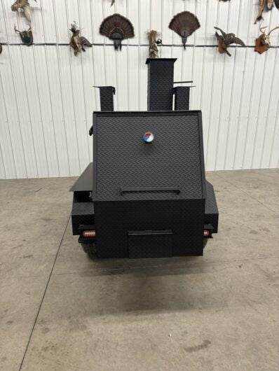 SNS Tailgater 60 trailer smoker and charcoal grill with rolled diamond tread steel body and slide out cooking racks