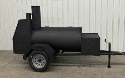 SNS Tailgater 60 trailer smoker and grill with barrel smoker and rear charcoal grill on a single-axle trailer